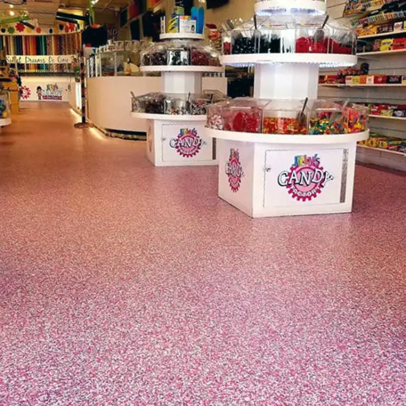 The Retail Store epoxy flooring has a custom, vibrant pink and white flake system