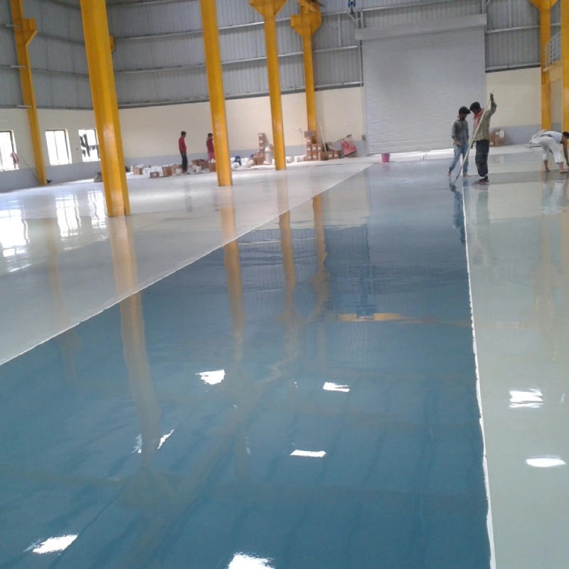 The foreground features newly applied, highly reflective and seamless Solvent-Free epoxy flooring